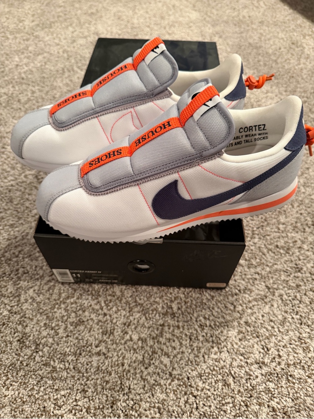 Nike White & Gray Sneakers with Navy Swoosh and Orange Accents